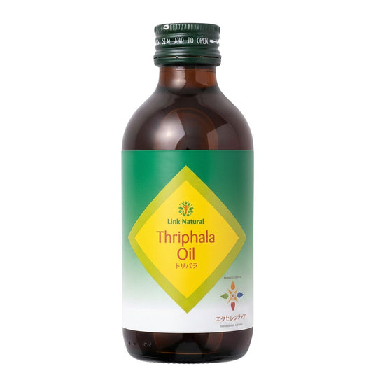 アーユルヴェーダの薬局のLink ナチュラル トリパラオイル180mL。緑と黄色のラベルが特徴的な日本限定のスキンケアオイルボトル