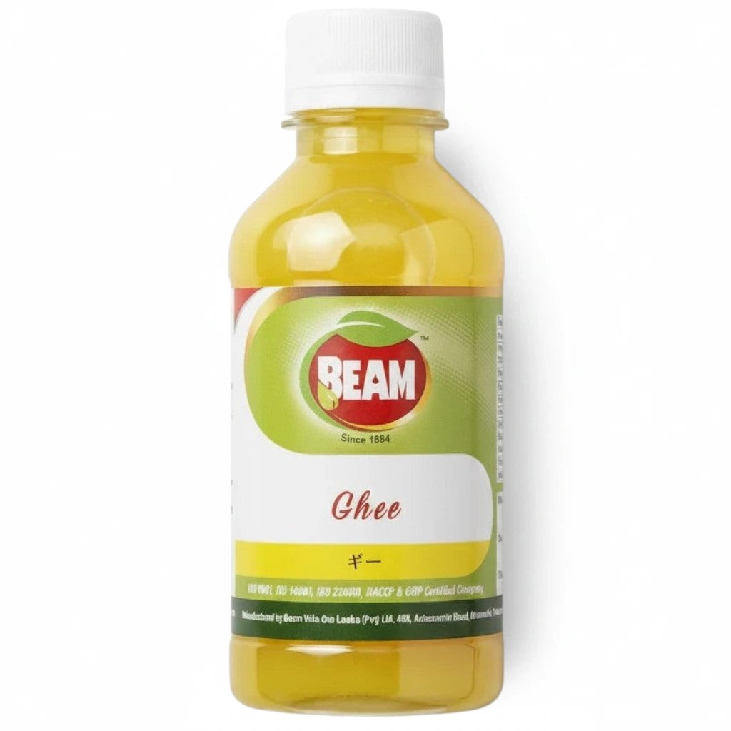 アーユルヴェーダの薬局のBEAMスキンケア専用ギー、黄色いオイルが入った透明なボトル